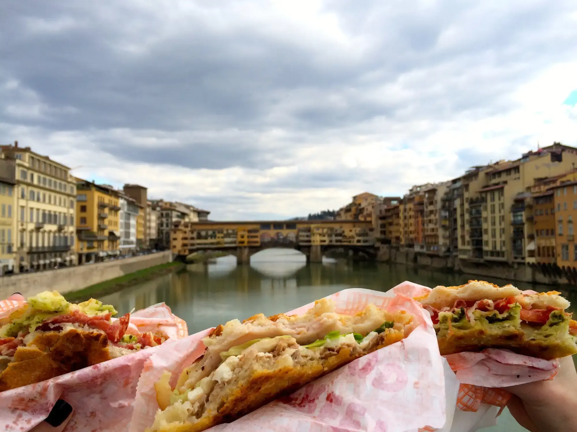 <span>Eat a </span><em>panino</em><span> from one of Florence’s many bridges - this one has a great view of the Ponte Vecchio</span>