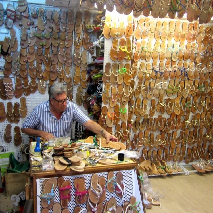 <span>Visit one of Sorrento’s many artisans - this one sells custom made sandals</span>