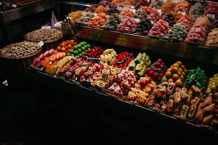 <span>Shop for groceries or pick up food to go at the famous La Boqueria, a market dating back to the 1200’s. You’ll find fresh fruit and veg, fish and seafood, butcher, charcuterie, fresh pressed juices, sandwiches and prepared foods, sweets, and much more</span>