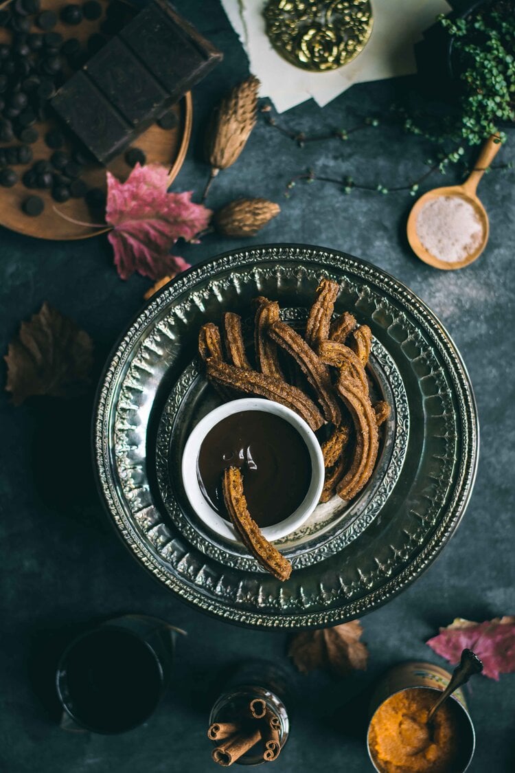 <span>Chocolatería San Ginés is Madrid’s most famous place (since 1894!) to get churros and hot chocolate. Popular among both locals and tourists, this is a MUST visit and is open 24 hours - perfect for a late night snack</span>